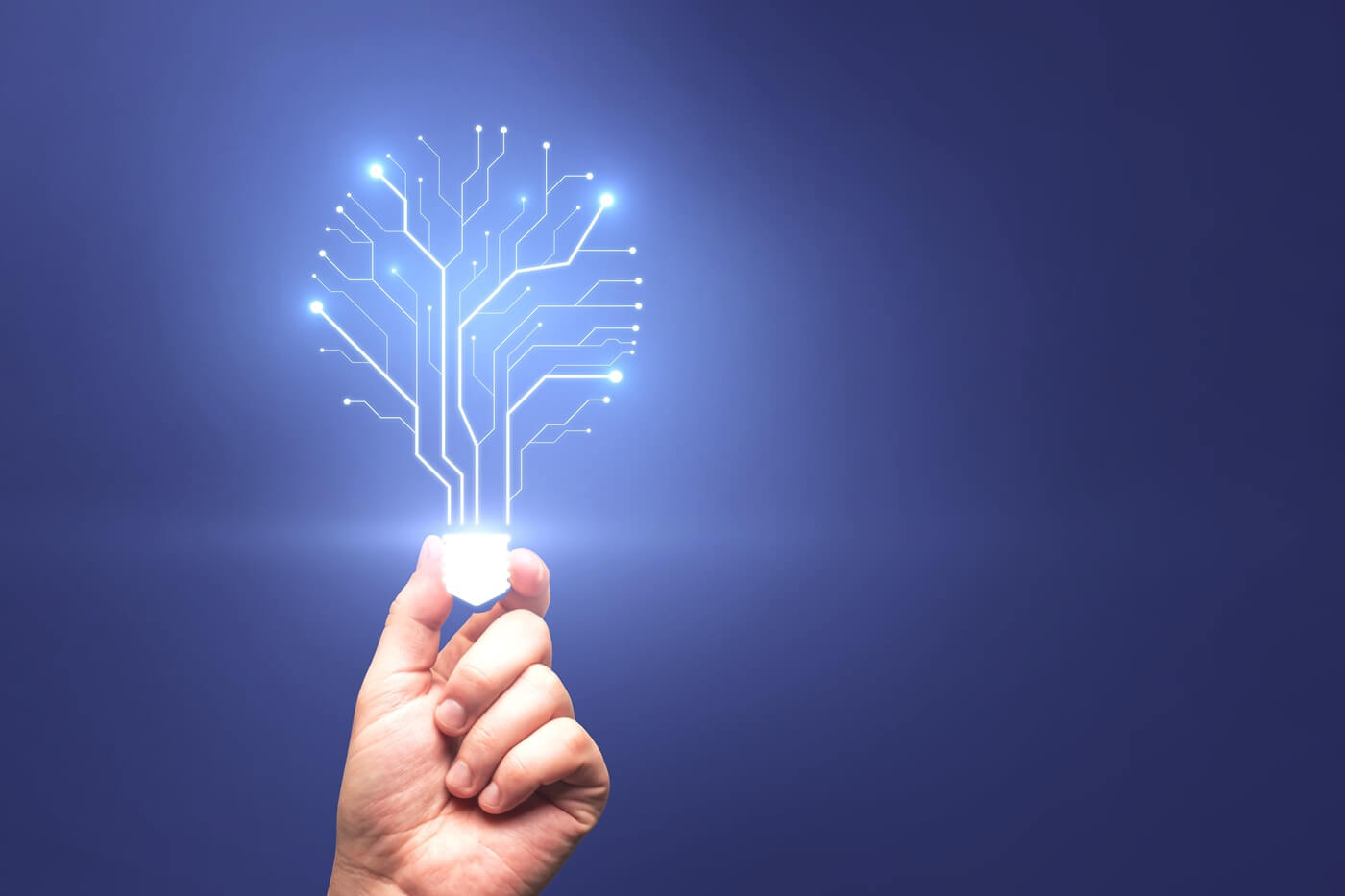 Automated Infrastructure and Intelligent Network Systems Hand holding glowing digital network representing automated infrastructure and intelligent system deployment