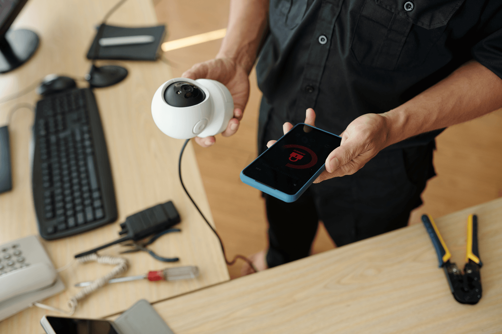 Technician manually configuring security camera during network installation